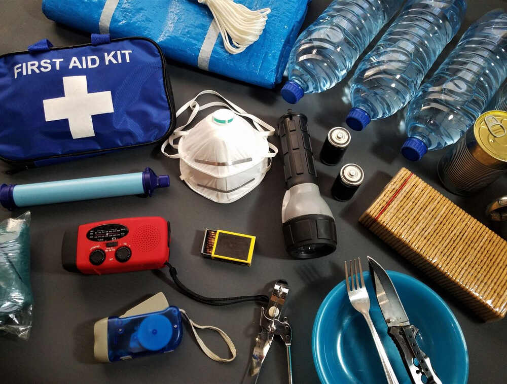 essential items included in a first aid kit for visiting national parks