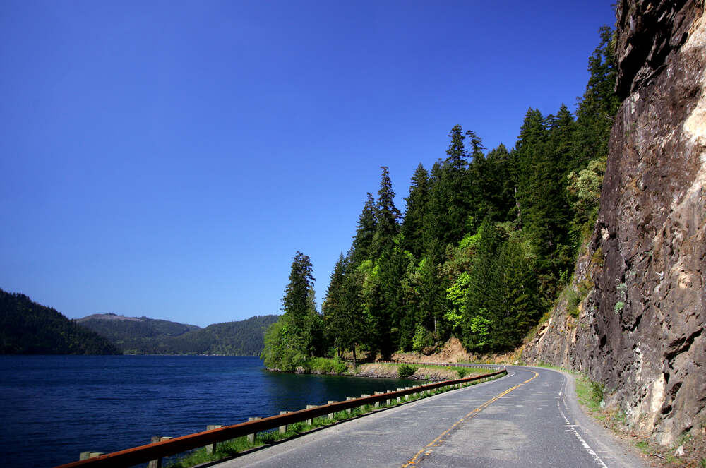 Lake Crescent Road winding its way along the edge of the beautiful waters of Lake Crescent
