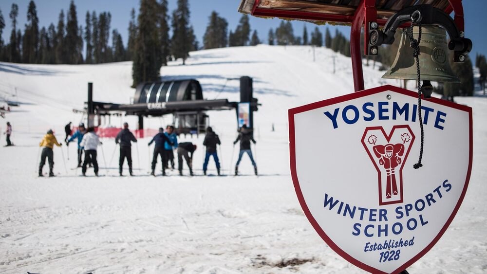 A group of skiers gather at the Badger Pass Ski Area in yosemite np